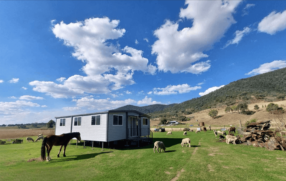 VanHomes: Double Expanding Van on Farm